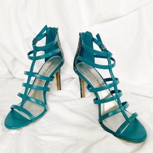 Blue strappy high heeled sandals. Size 7 1/2 US